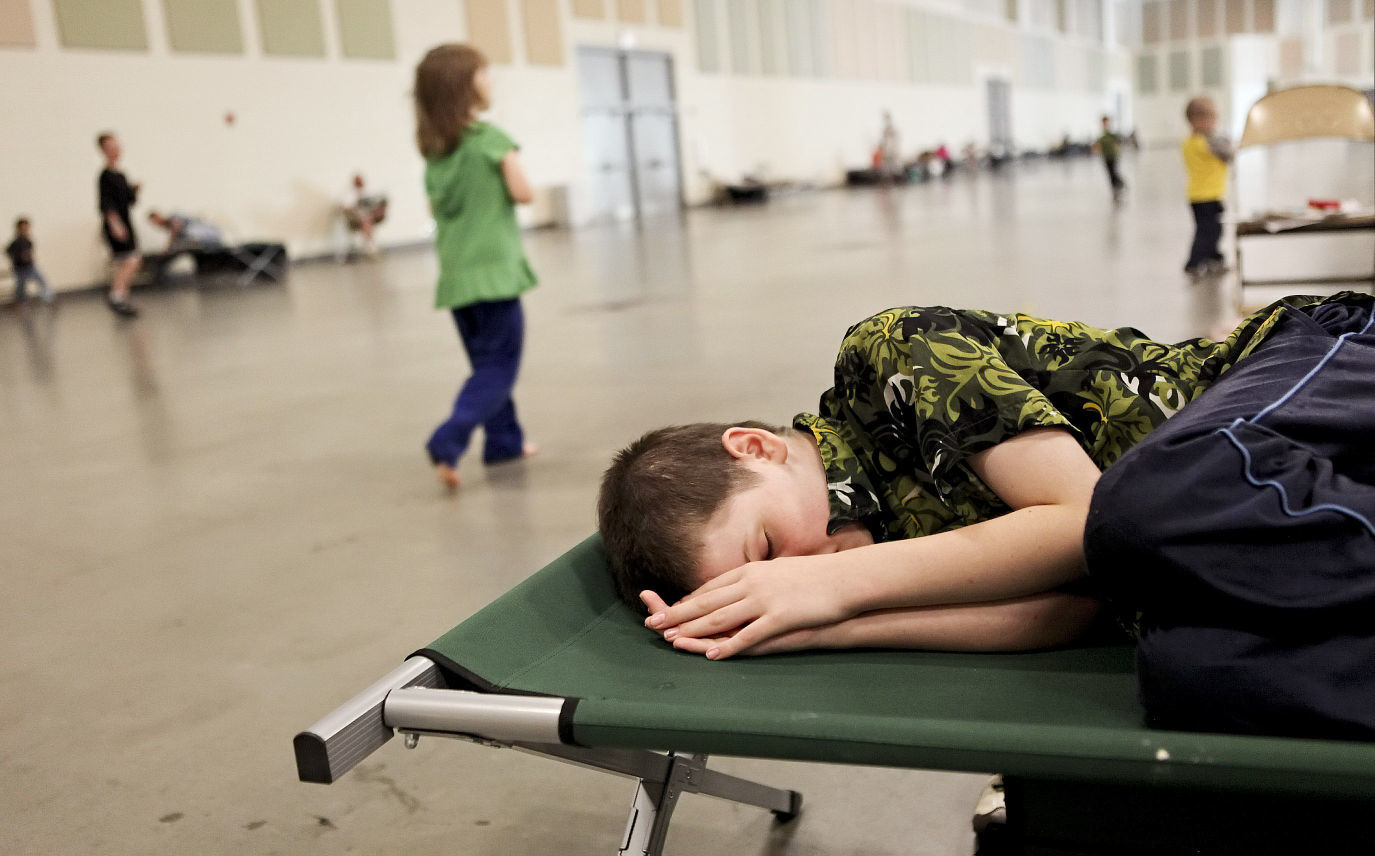 Boy on cot